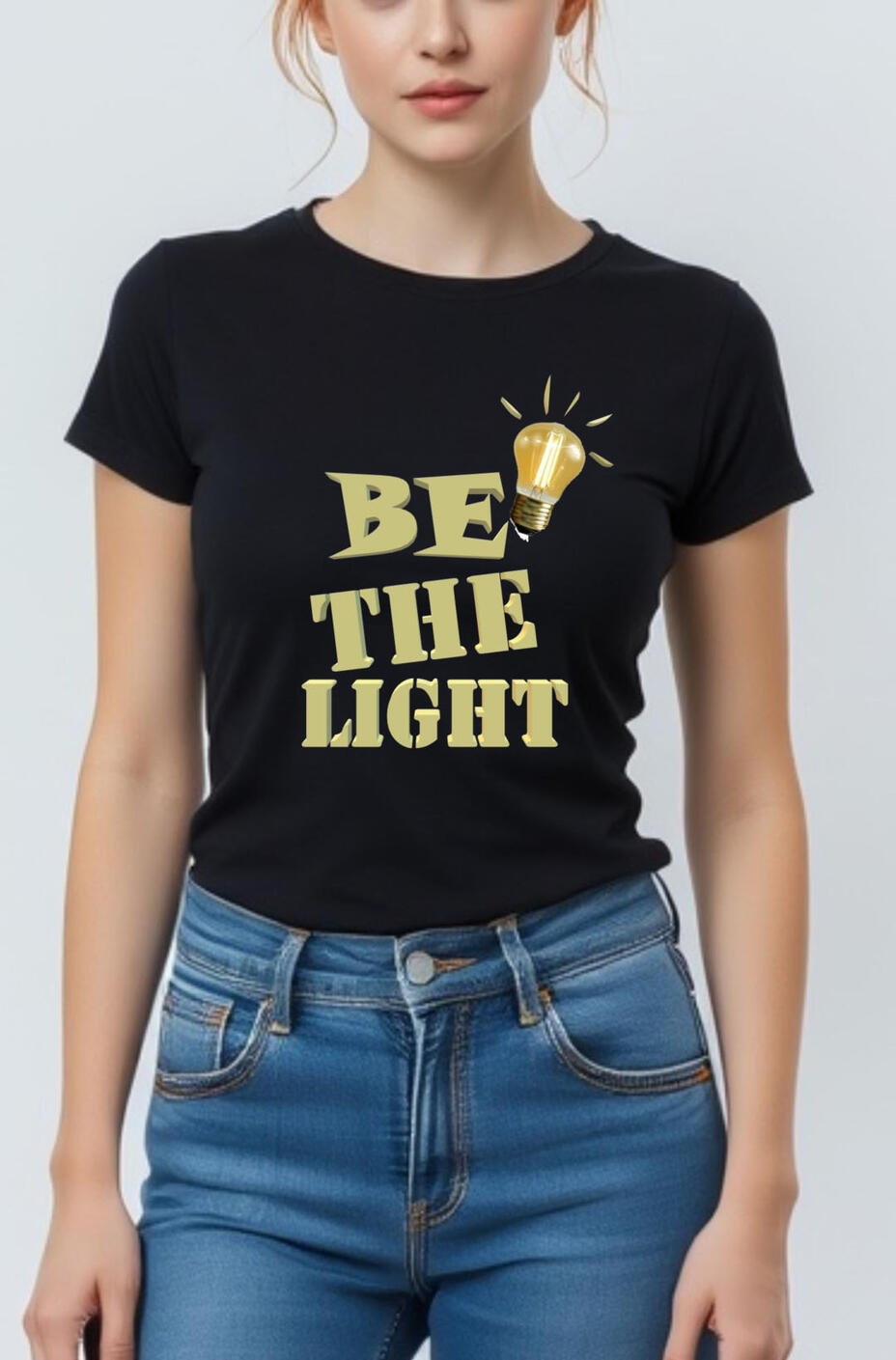 Be The Light Women's Christian T-shirt, featuring a gold light bulb