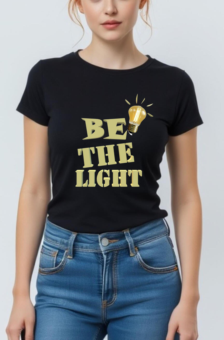 Be The Light Women's Christian T-shirt, featuring a gold light bulb