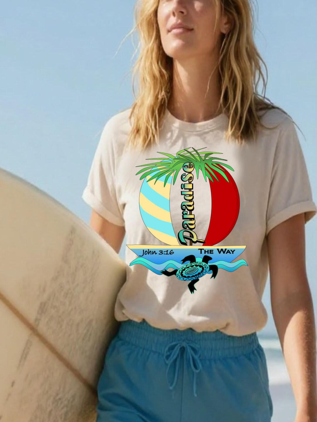 Paradise Way Christian Scripture T-shirt. Features a boat with a palm tree, a Tribal Turtle, and the scripture John 3:16.