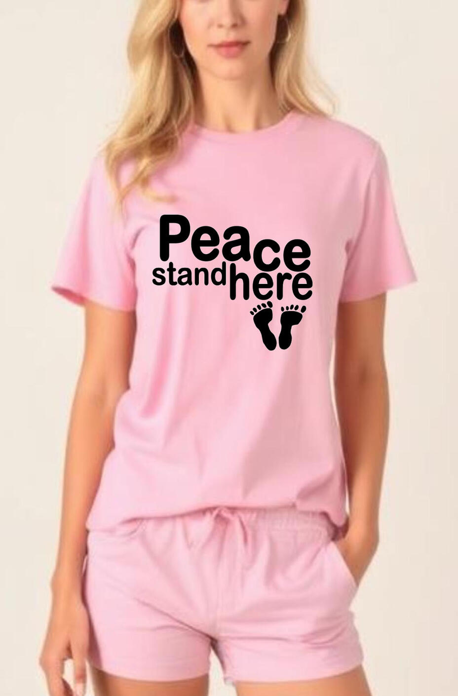 Peace Stand Here Christian T-shirt. Features a silhouette of two footprints.